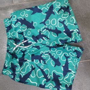 MiniBoden swim trunks